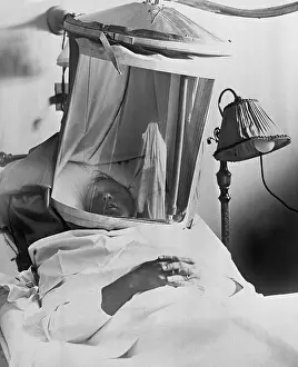 Ernest Staab Laying Under Oxygen Tent