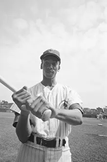 Shortstop Prints: Ernie Banks Holding Baseball Bat