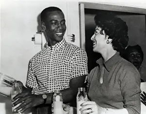 Filling Prints: Ernie Banks and Wife Preparing Baby Bottles