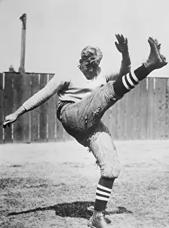 Football Uniform Prints: Ernie Nevers Kicking in Football Gear