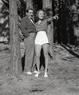 Ernst Lubitsch and Vivian Gaye Standing by Trees