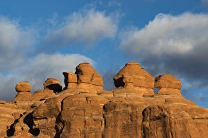 Images Dated 12th December 2015: Eroded rock formations at sunset in Arches National Park with clouds, Utah, USA