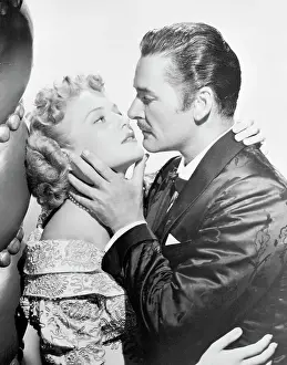 Errol Flynn Kissing Patricia Wymore