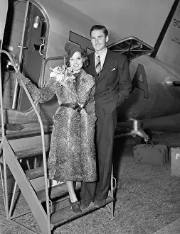 Airport Prints: Errol Flynn with Lili Damita at Airport