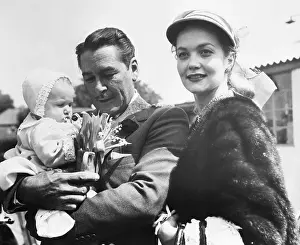 Errol Flynn with Wife and Daughter