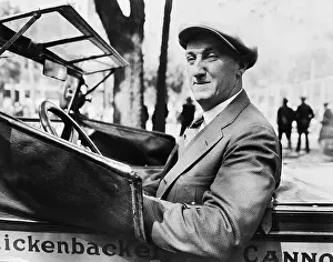 Baker Prints: Erwin Cannonball Baker Standing by Automobile
