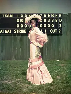 Ester Williams Wearing Long Pink Suit and Hat
