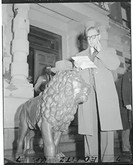 Portsmouth Prints: Estes Kefauver with His Hat Resting on Statue