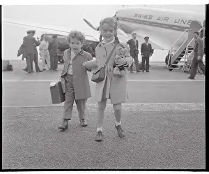 Victoria Chaplin Prints: Eugene and Victoria Chaplin at Airport