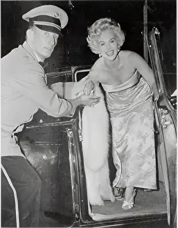 Eva Gabor Being Helped out of Her Limousine