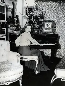 Eva Peron Playing The Piano