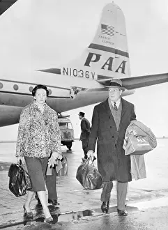 Eve Curie and Her Husband Departing From a Plane