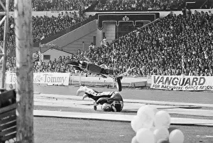 Evel Knievel Landing off his Motorcycle