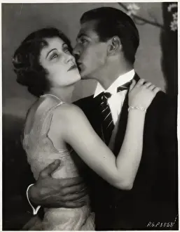 Hugging Prints: Evelyn Brent Being Kissed by Gary Cooper