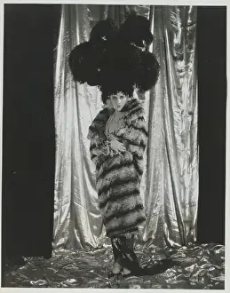 Evelyn Brent Wearing Fur Coat and Feather Headdress