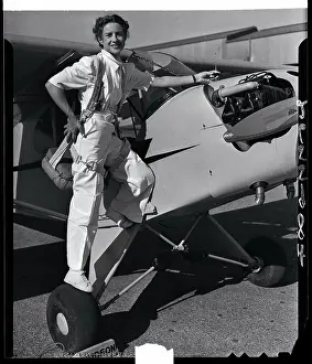 Alhambra Prints: Evelyn Hudson Standing on Plane Wheel