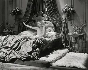 Pampering Prints: Evelyn Laye Stretching in Bed