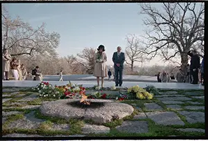 Prints of (Original Caption). Washington: Evelyn Lincoln, secretary to President John F. Kennedy, pays her respects at Kennedy's grave in Arlington National Cemetery on the 25th anniversary of his death Timeless Moments: Evelyn Lincoln Paying Respects at Grave