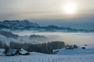 Snowcapped Gallery: Evening in the Appenzell region with a view on Mt. Saentis, Canton Appenzell Innerrhoden