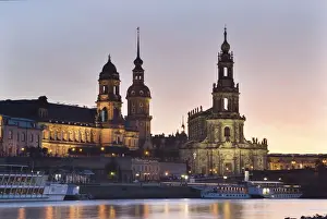 Evening mood in Dresden, as seen from the bank of the Elbe River with a view towards the Terrassenufer promenade with the Castle and Castle Church, Dresden, Saxony, Germany, Europe