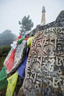 Images Dated 7th October 2016: Everest base camp trek, Himalayas, Nepal, Tengboche, mani stones, prayer flags, Colour Image
