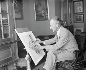 Everett Shinn Working in Studio