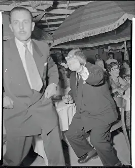 Ex-King of Egypt Farouk Blocking Photographer's View of His Face