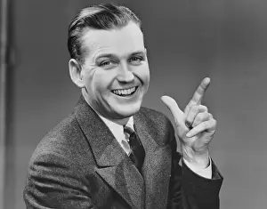 Executive smiling and gesturing