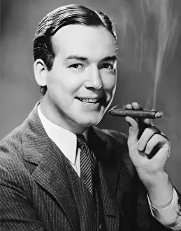 Executive smoking cigar
