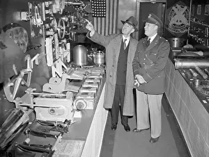 Expert on Exhibit Explaining it to Navy Official