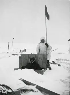 Antarctica Prints: Explorer at Trap Door of Cabin in Antarctica
