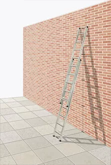 Extendable ladder against brick wall