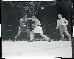 Ezzard Charles Punching Gus Lesnevich