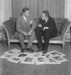 F. Scott Fitzgerald and Cornelius Vanderbilt Looking at Photographs