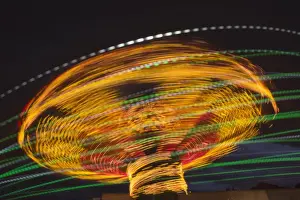 Fairground ride light effect at night