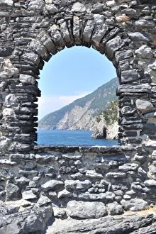 Images Dated 23rd July 2015: Fairytale arched window facing the sea