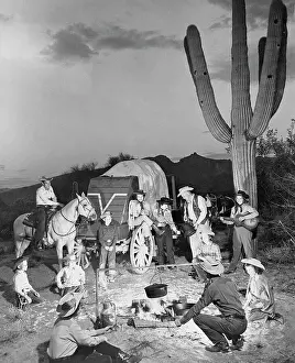 Campfire Prints: Families Around Campfire at a Dude Ranch