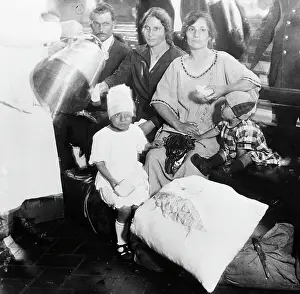 Families Seated on Bench on Ellis Island