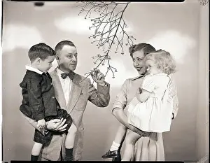 Family Admiring Dogwood Tree Blooms