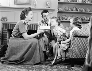 Eating Gallery: Family celebrating sons birthday
