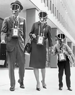 Gas Mask Prints: Family Displaying Gas Masks