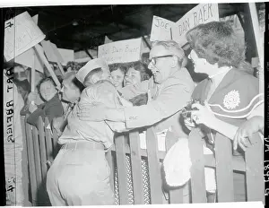 Family Greeting a Soldier
