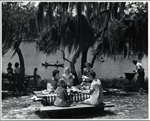 Picnic Prints: Family Having a Lakeside Picnic