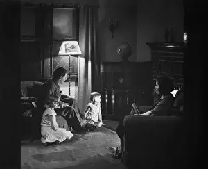 Family Listening to Radio at Home