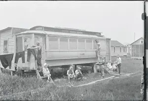 Family Members Outside Trolley Dwelling