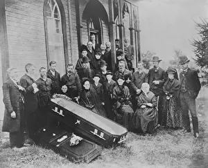 Family with Open Coffin