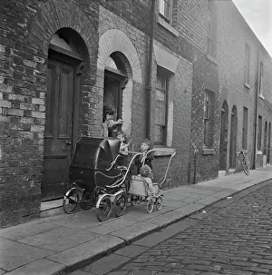 Huty33006 Prints: A Family Outside their Home In Salford