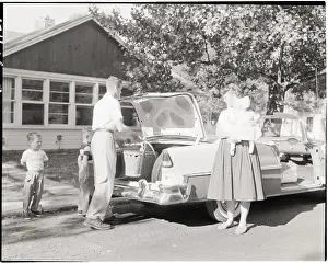 Parked Prints: Family Placing Picnic Basket in Car