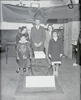 Grief Prints: Family Posing Around Coffin with Infant