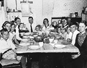 Dinner Prints: Family Seated At Dinner Table